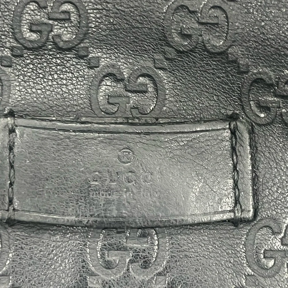 Gucci Guccissima Black Leather Messenger Bag